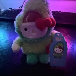 Hello Kitty Plush in Green Outfit with Red Bow